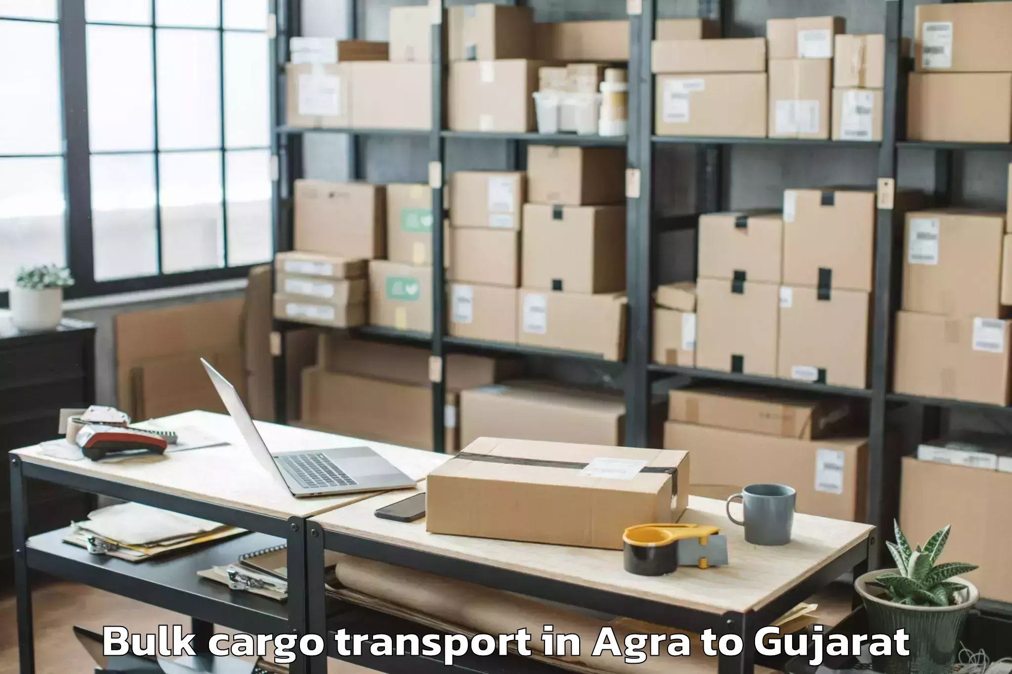 Book Agra to Songadh Bulk Cargo Transport Online